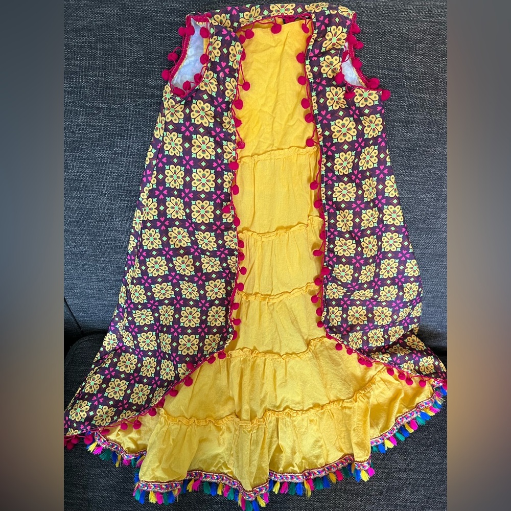 Beautiful, FUN dress with pompom edged cover